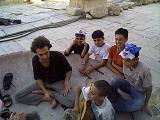 © Photo by Dhyan: All Nations café Jerash, local kid's playing & singing, Jul 29