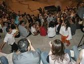 © Photo by Miriam: Dhyan and Lisa dancing infront of thousands of Circassians, Jerash South Theater, Aug 1